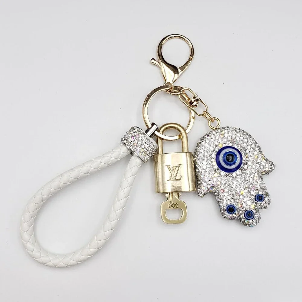 Authentic Louis Vuitton Lock & Key with unbranded Evil Eye Bagcharm